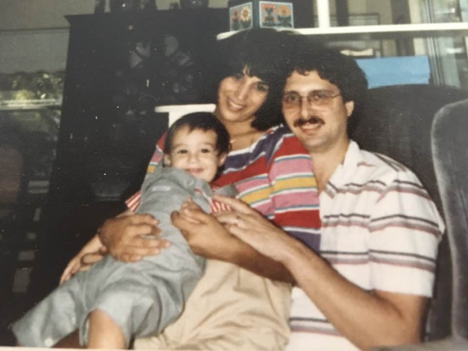 A young Debra Karen Werner with her husband and their son